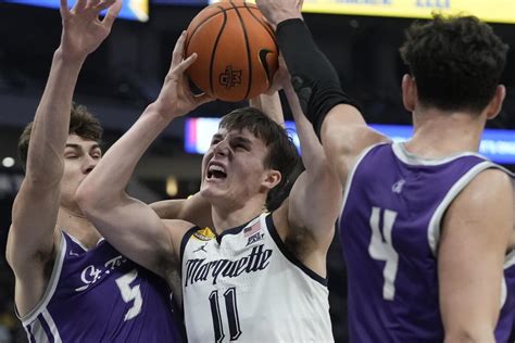 No. 7 Marquette fends off underdog St. Thomas in final minutes, wins 84-79